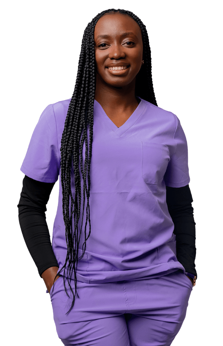 Nurse smiling in blue scrubs